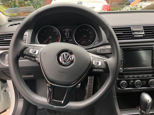 Where it says “Passat” there was originally an analog clock when the model debuted. VW removed it with the facelift. Somewhat taking its place is the infotainment system that now has a large color screen standard and displays an analog clock graphic when the system is “off.”